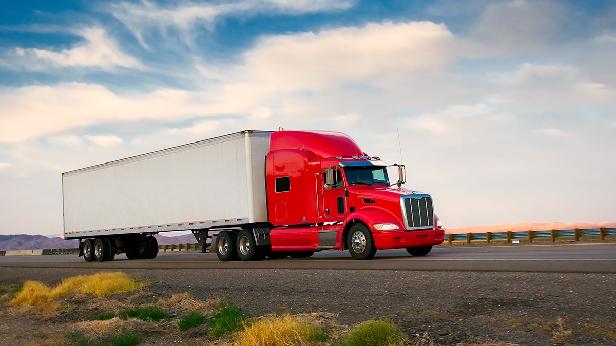 red white truck for cross country moving